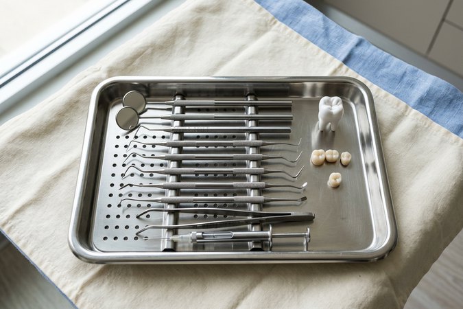 Sterilized dental instruments arranged on a surgical tray